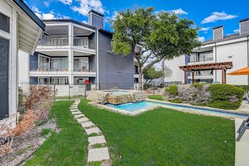 A modern house with a pool in the backyard.